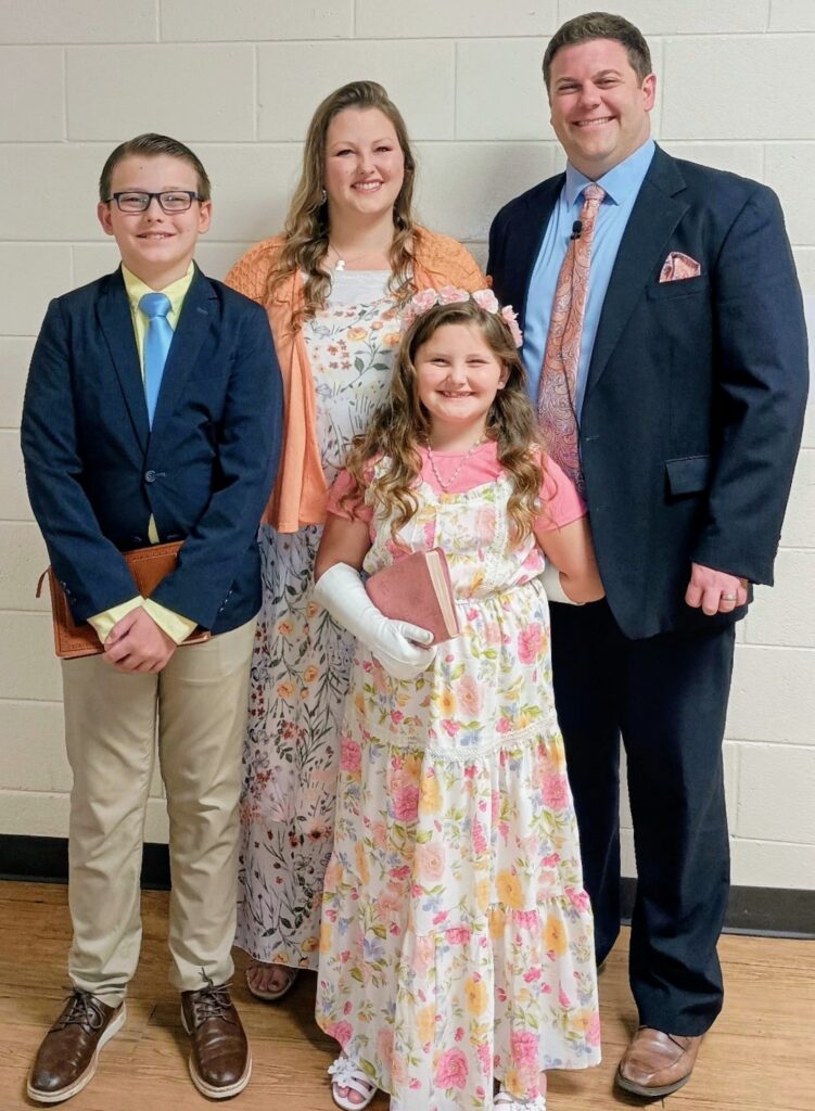 Pastor Chris Reynolds with his wife, Courtney, and their children, Aaron and Evelyn